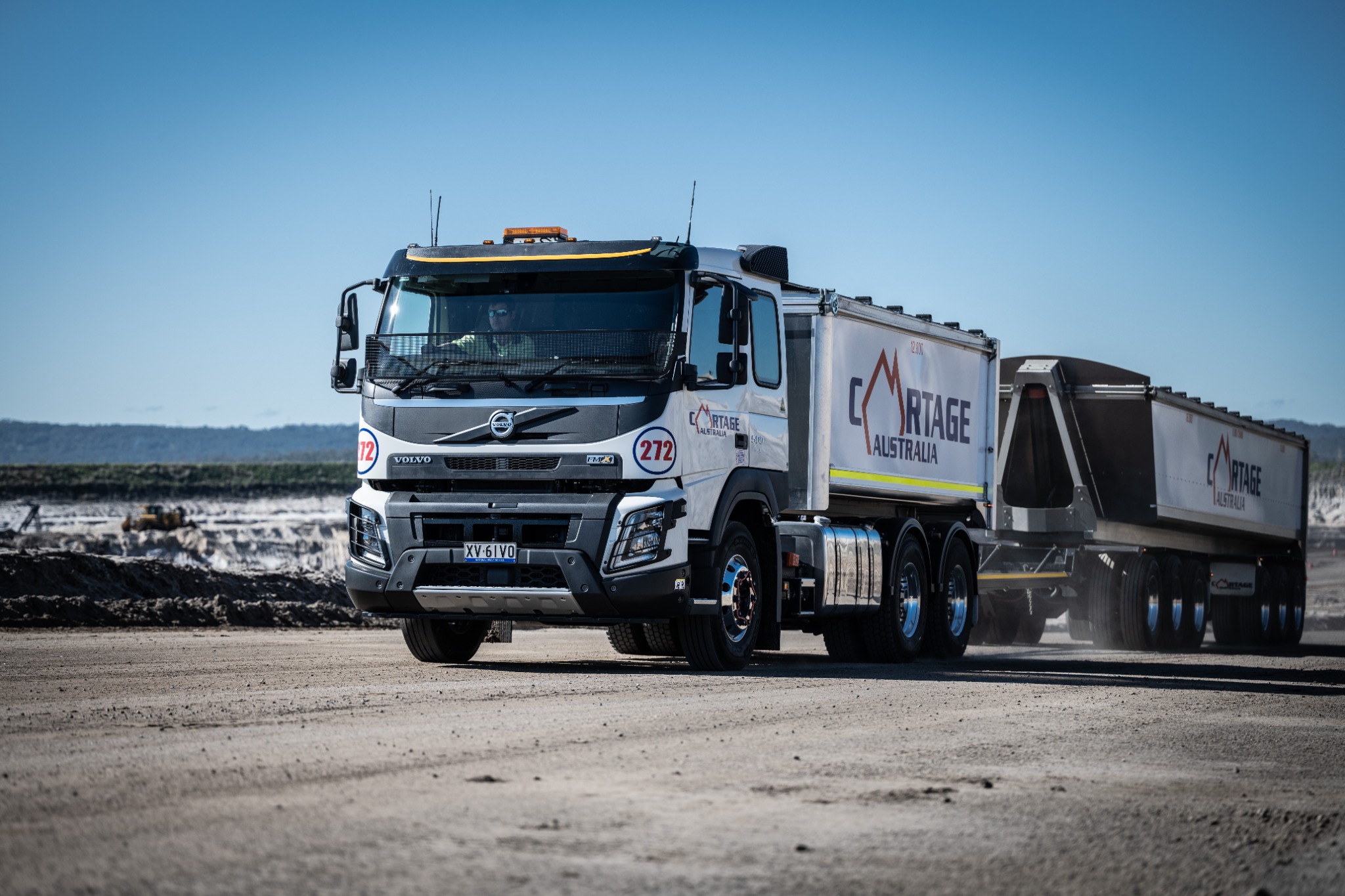 Cartage Australia bulk haulage truck and trailer operating at a quarry